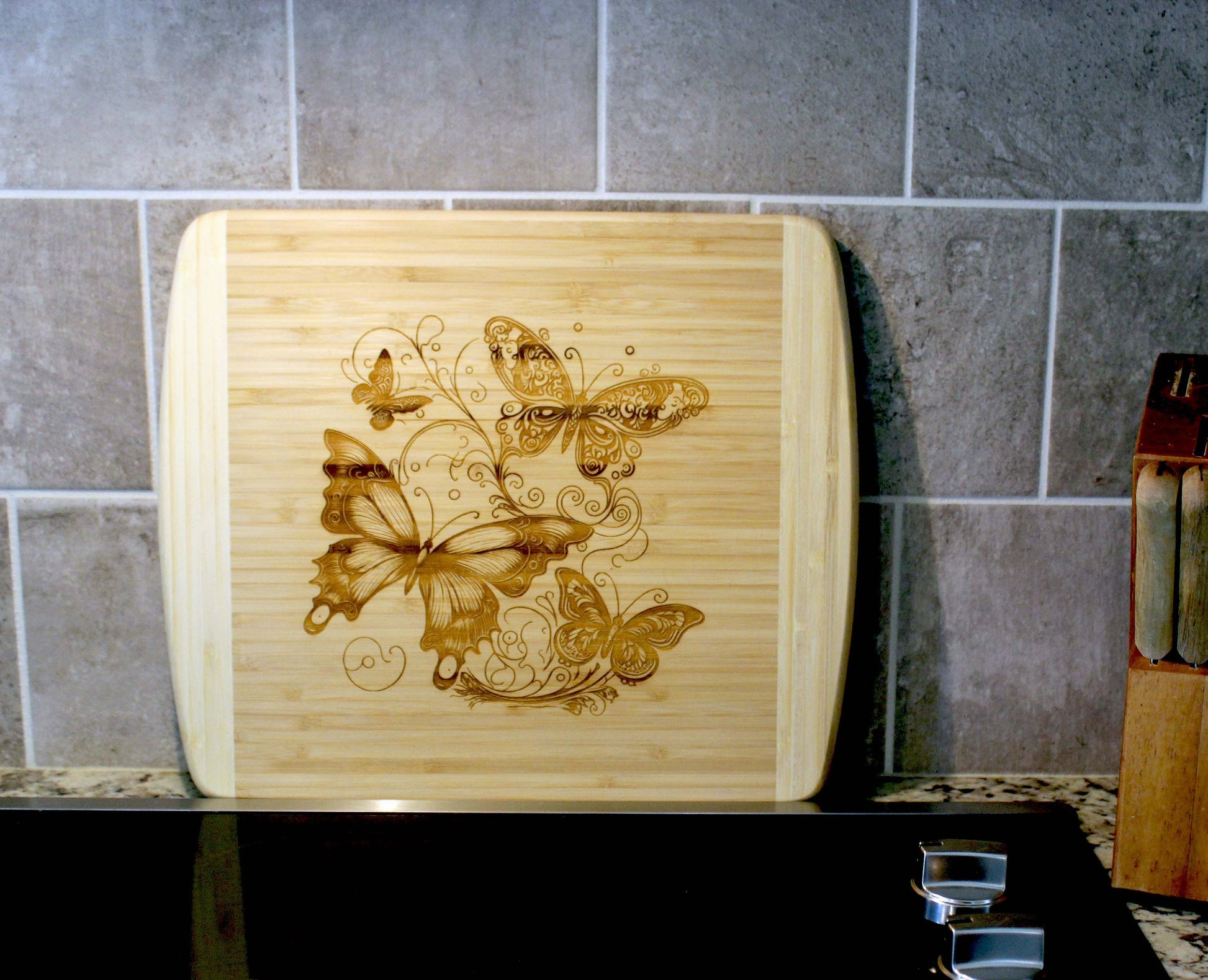 Fluttering Butterflies Decorate this Bamboo Cutting Board and can be Personalized, Environmentally Friendly Gifts and Wood Easel Include