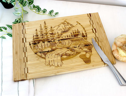 Mountain Fishing Design Decorate this Bamboo Cutting Board and can be Personalized, Environmentally Friendly Gifts and Wood Easel Include