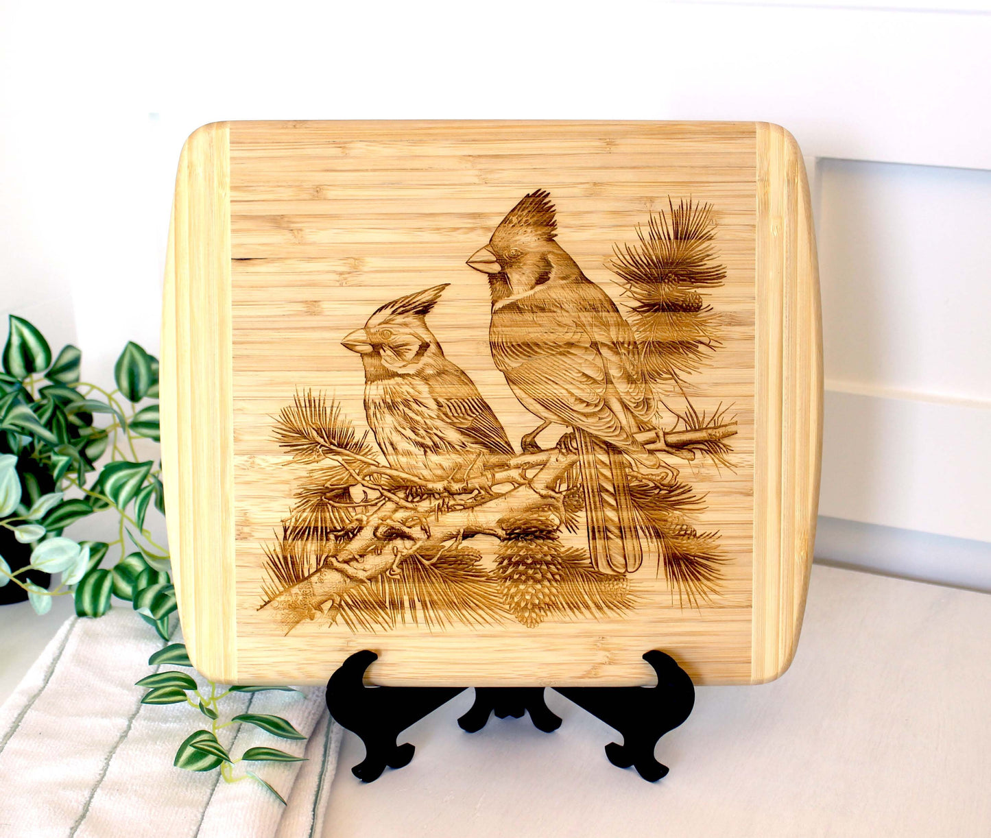Cardinals on Pine Tree Limb Decorate this Bamboo Cutting Board & can be Personalized, Environmentally Friendly Gifts and Wood Easel Include
