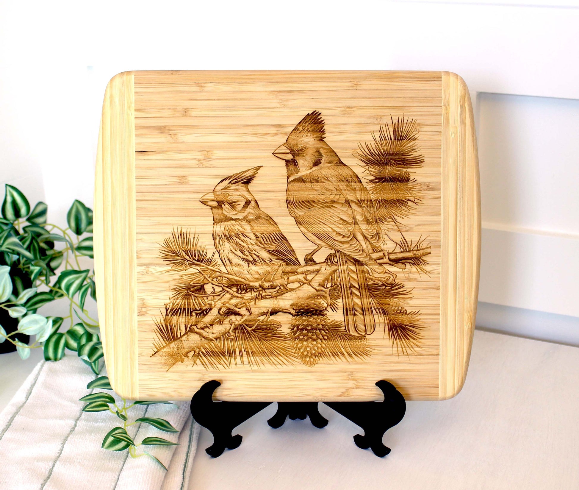 Cardinals on Pine Tree Limb Decorate this Bamboo Cutting Board & can be Personalized, Environmentally Friendly Gifts and Wood Easel Include