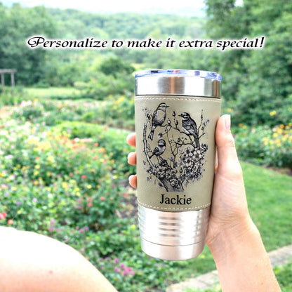 Beautiful Detailed Cherry Blossoms/Birds Engraved on this Insulated Coffee Travel Mug made of Stainless Steel and wrapped with Leatherette