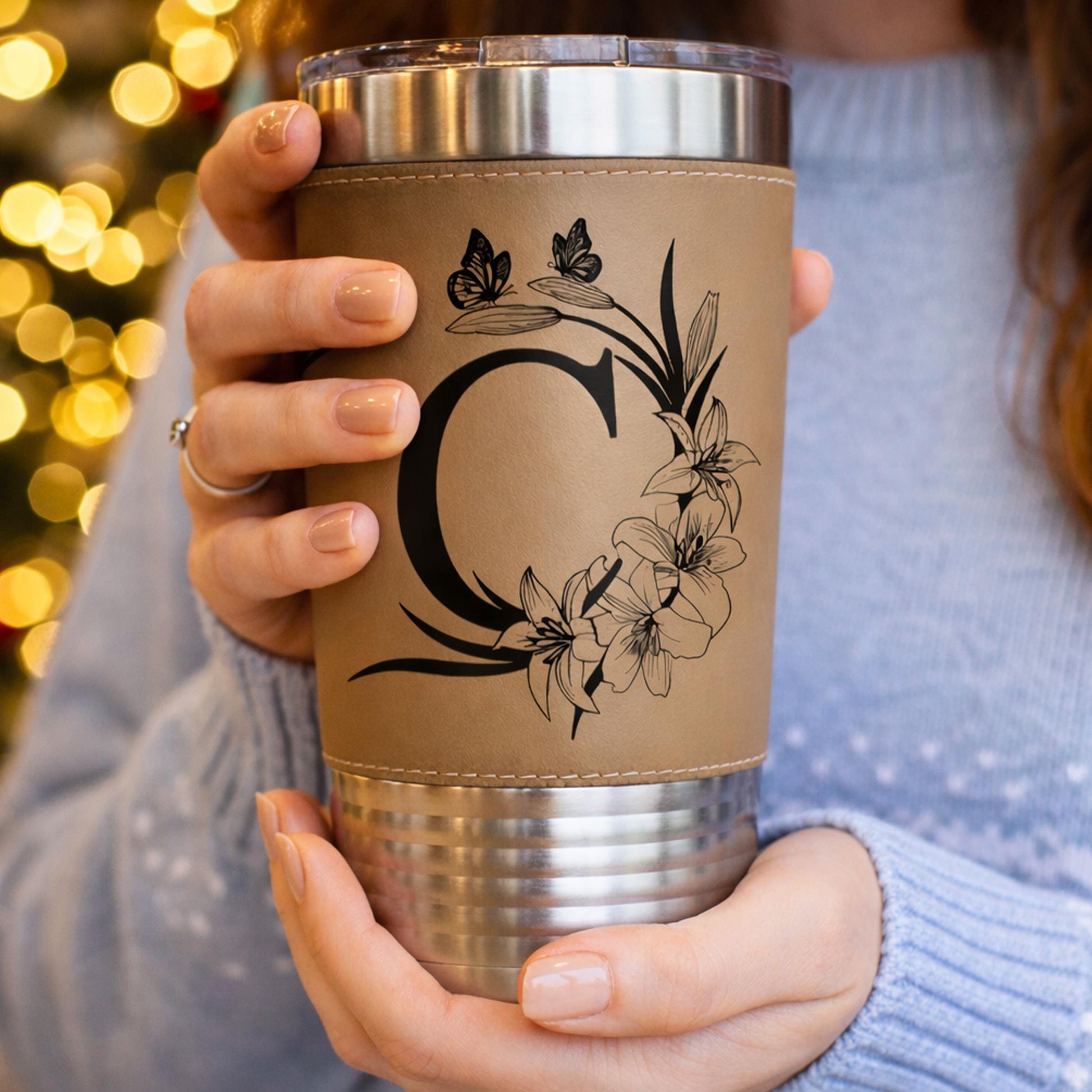 Floral Butterfly Monogram Engraved on this Insulated Coffee Travel Mug made of Stainless Steel and wrapped with Leatherette; Choose Design