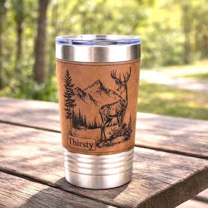 A New Deer in the Mountains Design is Engraved on Leather wrapped travel mug, the Perfect Deer Hunter Gift for Men & Women who love to Hunt