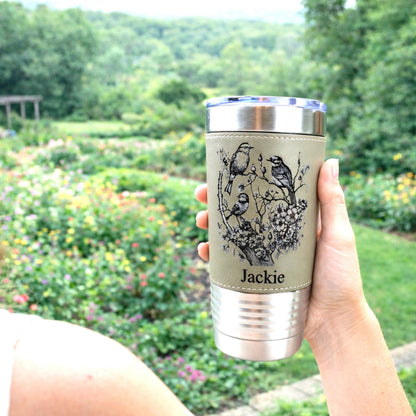 Beautiful Detailed Cherry Blossoms/Birds Engraved on this Insulated Coffee Travel Mug made of Stainless Steel and wrapped with Leatherette