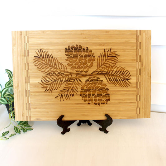 Pine Cone Home Decor - Bamboo Cutting Board with a decorative pinecone design - Environmentally Friendly Gifts, Wooden Easel Included