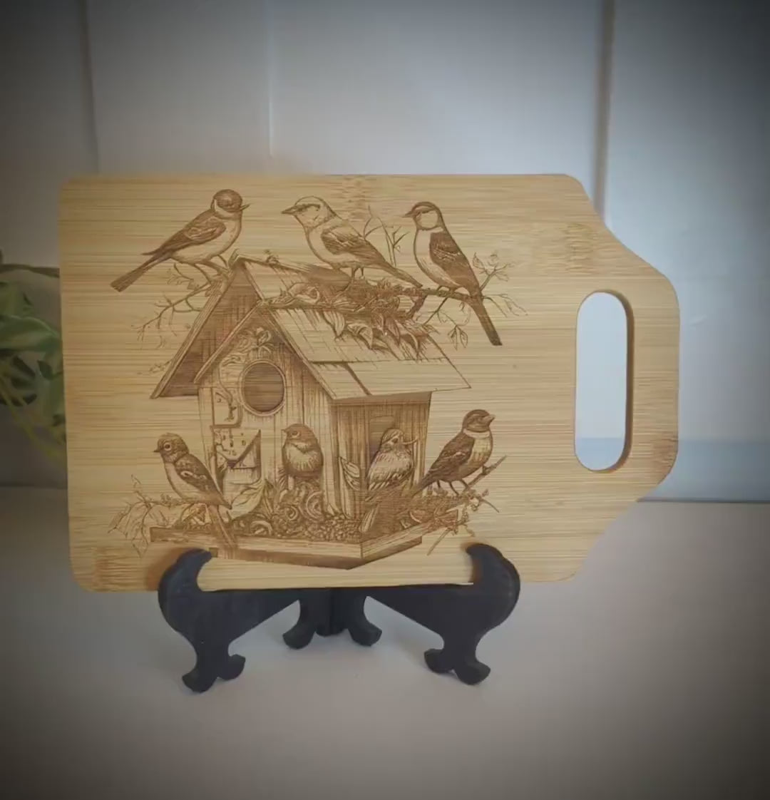 Beautiful Detailed Birdhouse/Birds Engraved on a Bamboo Cheese Cutting Board. Decorate your Kitchen.  Wooden easel included.