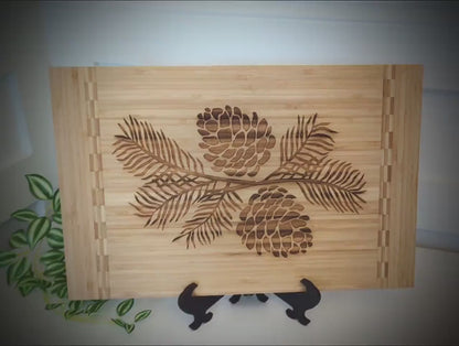 Pine Cone Home Decor - Bamboo Cutting Board with a decorative pinecone design - Environmentally Friendly Gifts, Wooden Easel Included
